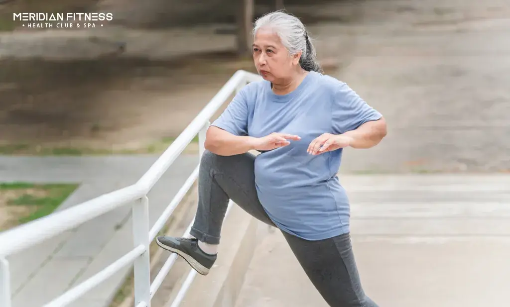 Warm Up: Arm circles with high knees